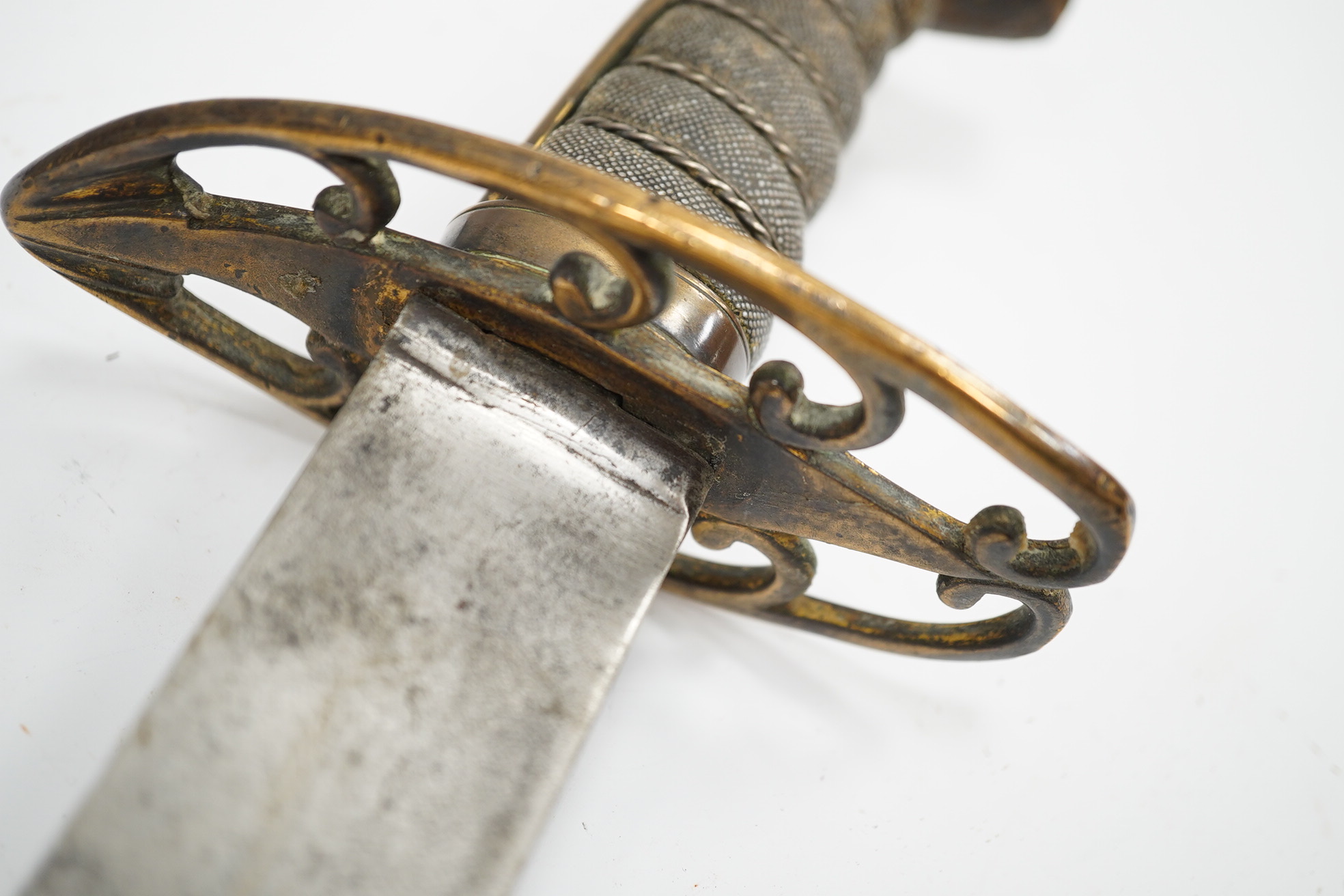 A Baker and son, Belford St. Great Garden 1803 pattern infantry officer’s sword with plain blade, regulation hilt (the knucklebow now missing), in its leather scabbard, chape is missing. Condition - fair, well worn.